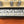 Load image into Gallery viewer, DOMINOES CORONA EXTRA WITH 2 WOOD HOLDERS- BLACK
