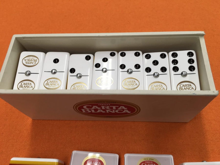 DOMINOES CARTA BLANCA WITH 2 WOOD HOLDERS.