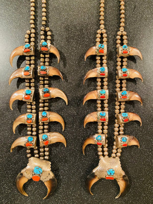 Pair of his and hers Vintage Navajo Pawn sterling Turquoise/Coral Squash blossoms with claws