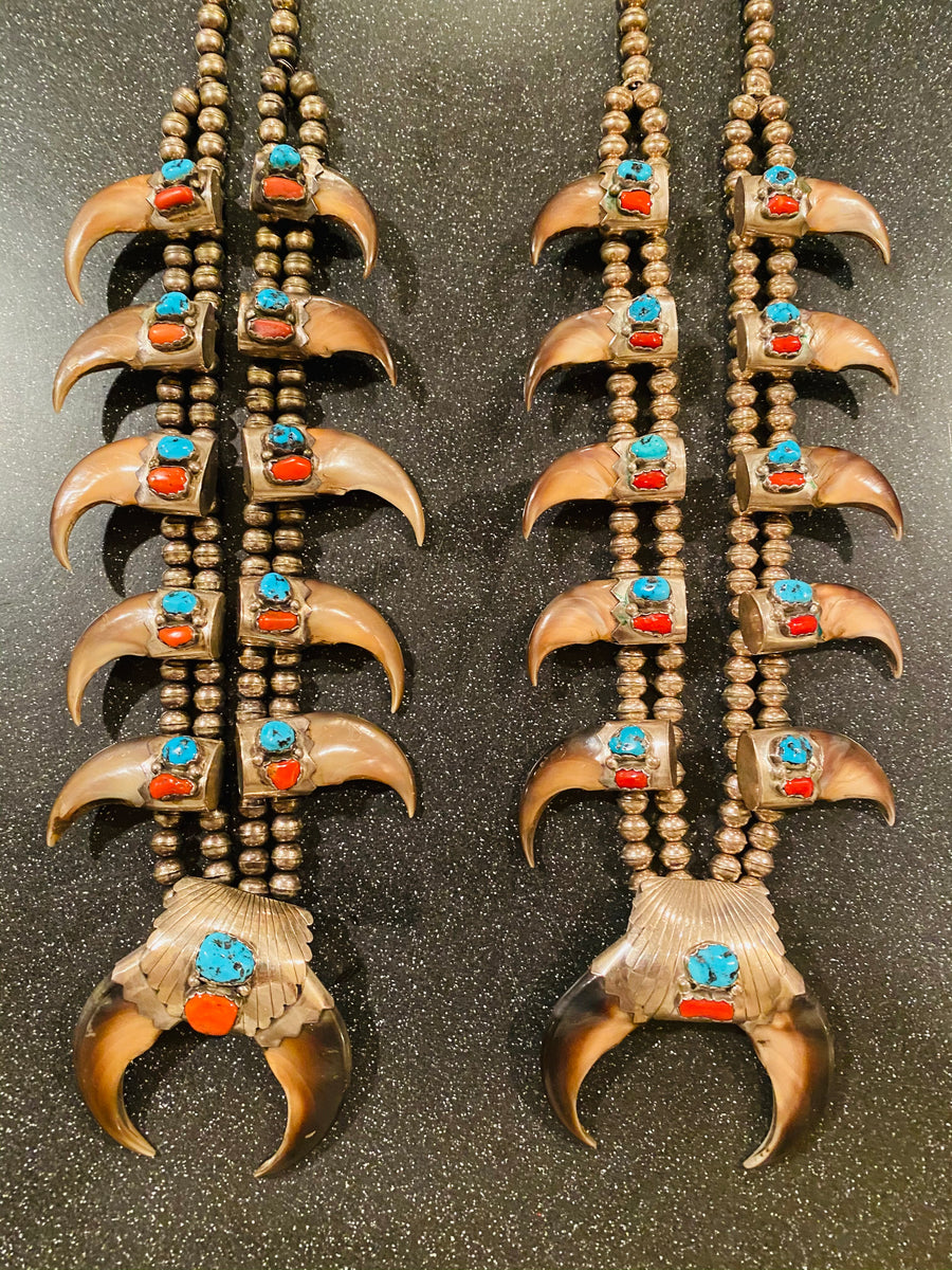 Pair of his and hers Vintage Navajo Pawn sterling Turquoise/Coral Squash blossoms with claws