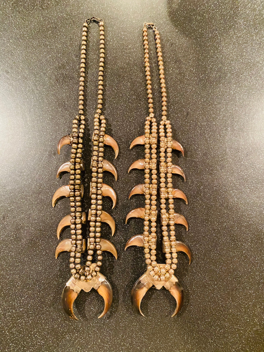 Pair of his and hers Vintage Navajo Pawn sterling Turquoise/Coral Squash blossoms with claws
